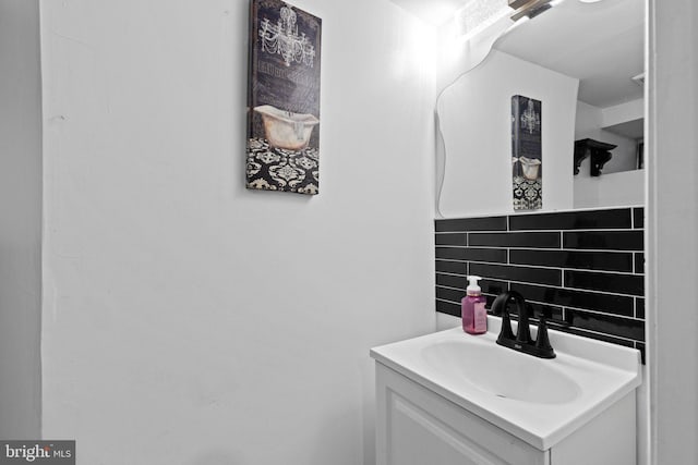 bathroom with backsplash and vanity