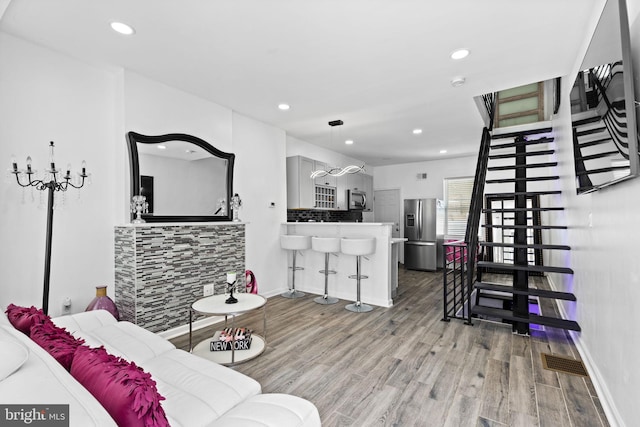 living room featuring hardwood / wood-style floors