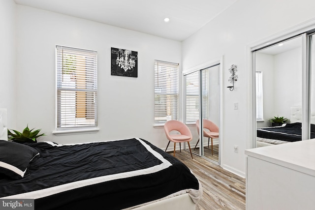 bedroom with light hardwood / wood-style flooring