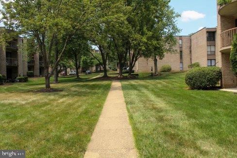 view of community featuring a lawn