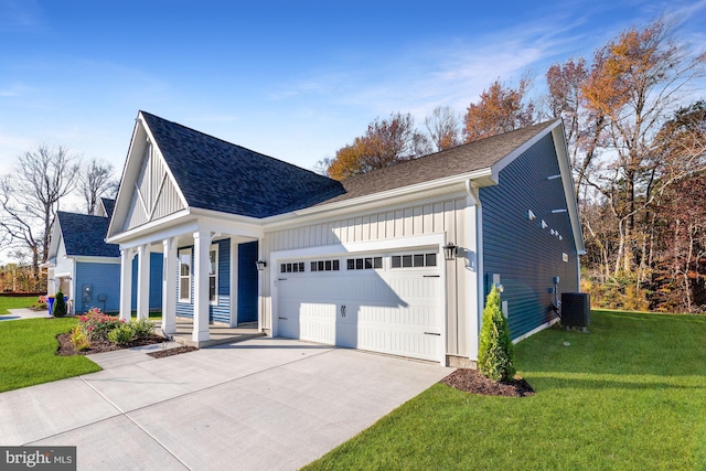 view of home's exterior with central AC, a garage, and a lawn