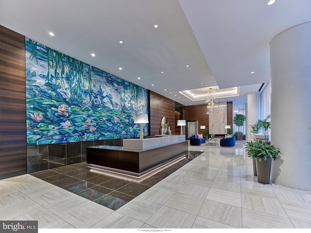 reception area with a chandelier