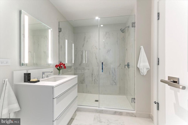 bathroom with vanity and an enclosed shower