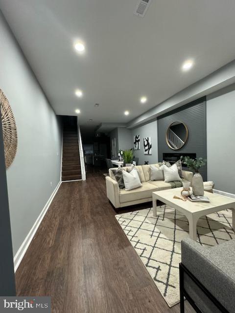 living room featuring wood-type flooring