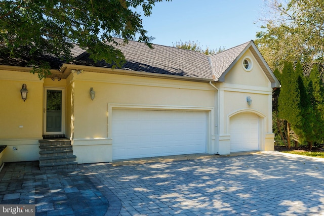 ranch-style house featuring a garage