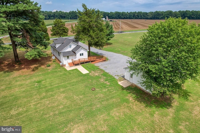 birds eye view of property with a rural view