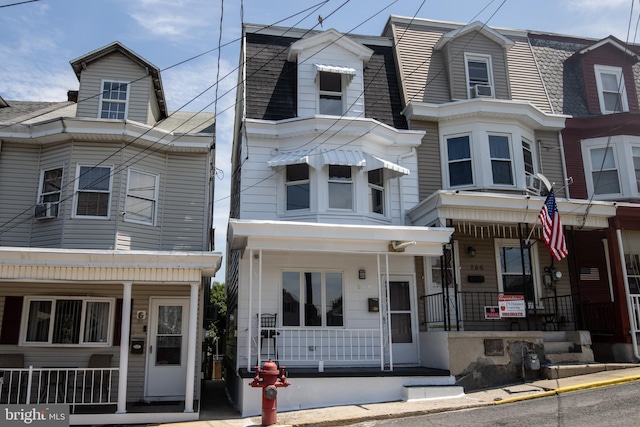 view of front of property featuring covered porch