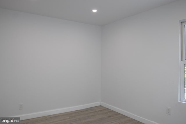 spare room featuring light wood-type flooring