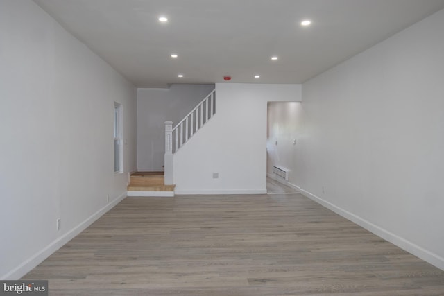 unfurnished living room with light wood-type flooring