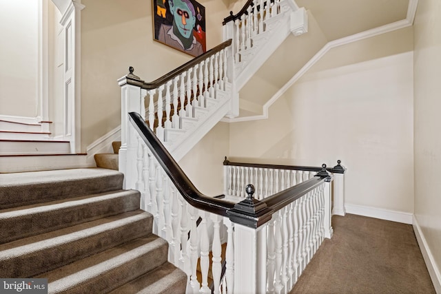 stairway featuring carpet flooring, lofted ceiling, and ornamental molding