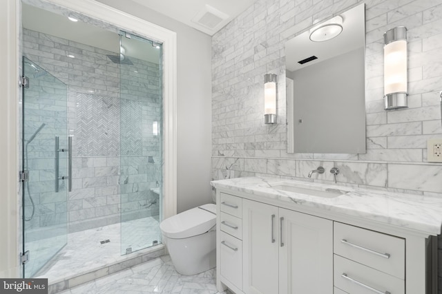 bathroom with walk in shower, vanity, tile walls, and toilet