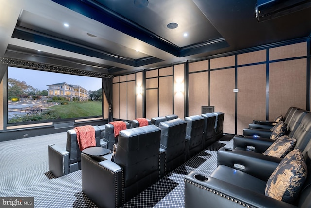 carpeted home theater room with wood walls