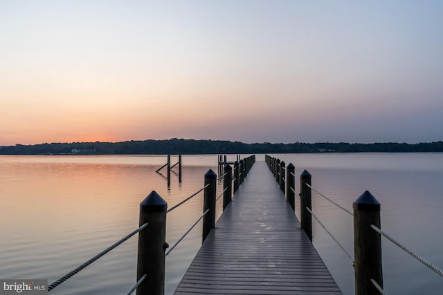 view of dock with a water view