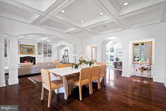 dining room with built in shelves, beam ceiling, decorative columns, and coffered ceiling