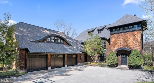 view of front of home with a garage