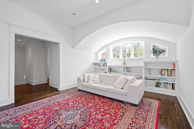 living room with dark wood-type flooring