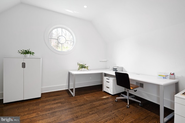 office featuring vaulted ceiling and dark wood-type flooring