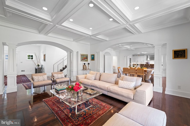 living room featuring crown molding, beamed ceiling, and coffered ceiling