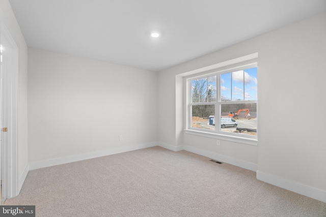 view of carpeted spare room