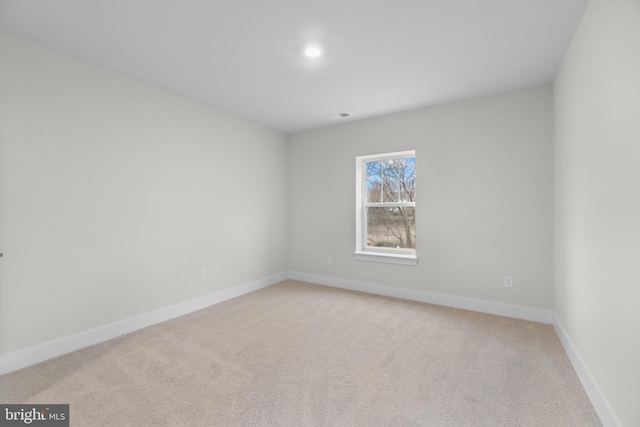 view of carpeted spare room