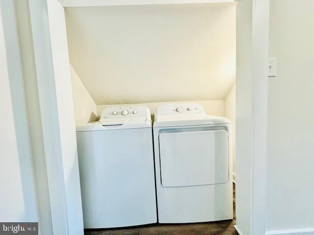 clothes washing area featuring washing machine and dryer