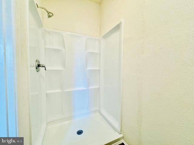 bathroom with walk in shower