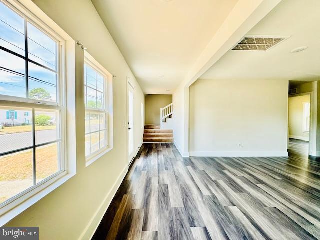 interior space with hardwood / wood-style floors