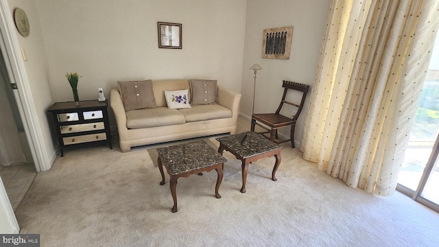 living room featuring light colored carpet