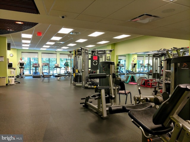 gym featuring a paneled ceiling