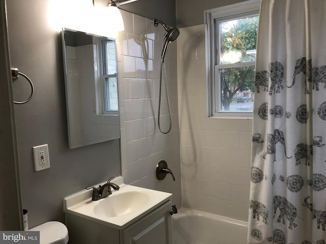 full bathroom featuring vanity, toilet, and shower / bath combo