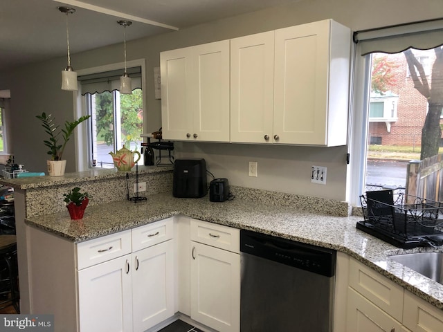 kitchen featuring kitchen peninsula, light stone counters, decorative light fixtures, dishwasher, and white cabinetry