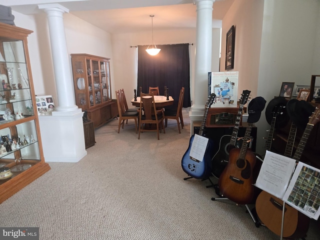 dining space featuring carpet flooring