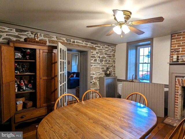 dining room featuring ceiling fan and radiator