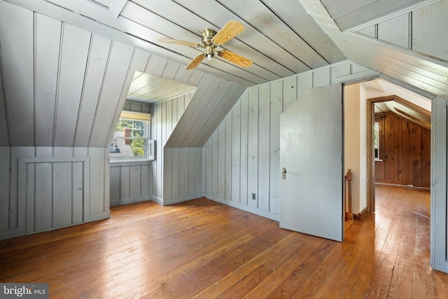 bonus room with ceiling fan, vaulted ceiling, and light hardwood / wood-style flooring