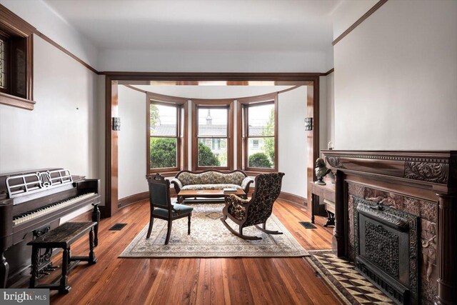 dining area with wood-type flooring and french doors