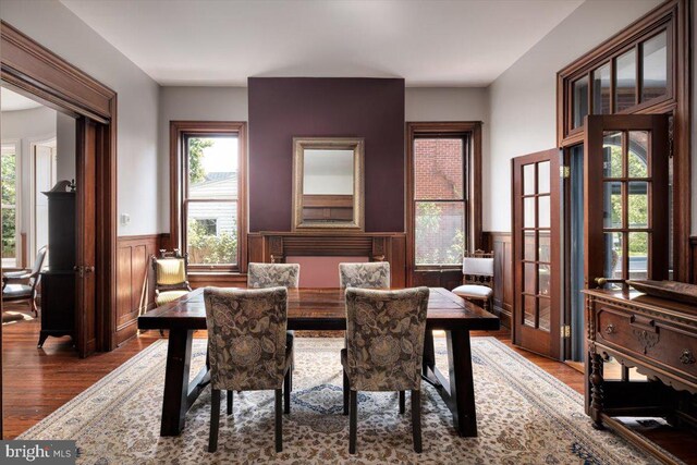 walk in closet with dark wood-type flooring