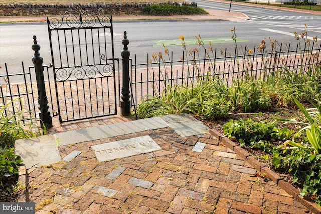 202 S Washington St, Winchester, VA 22601 - view of patio / terrace with a gate and a water view