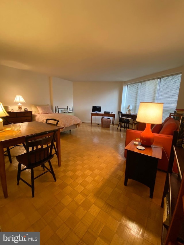 dining space with light parquet floors