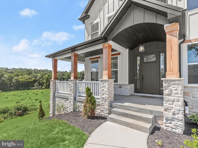 entrance to property with a porch