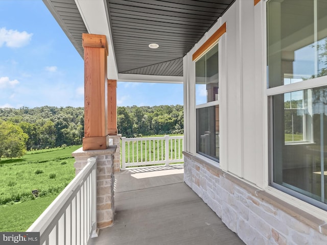 balcony featuring a porch