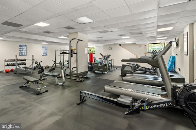 workout area with a drop ceiling