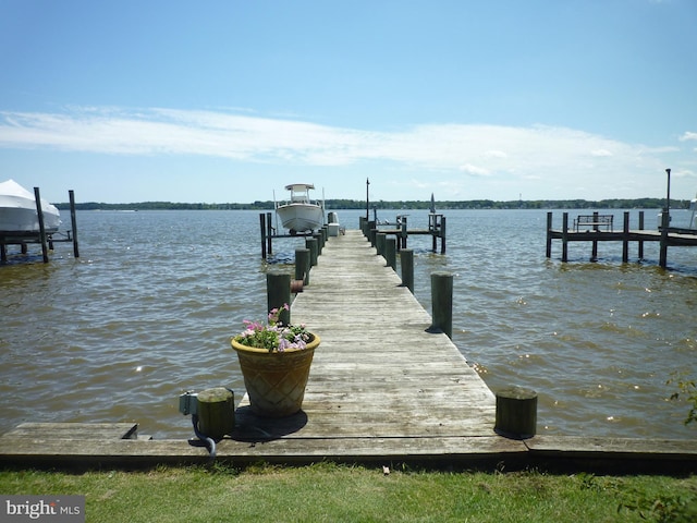 view of dock featuring a water view