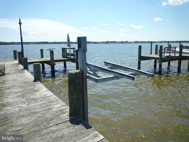 view of dock featuring a water view