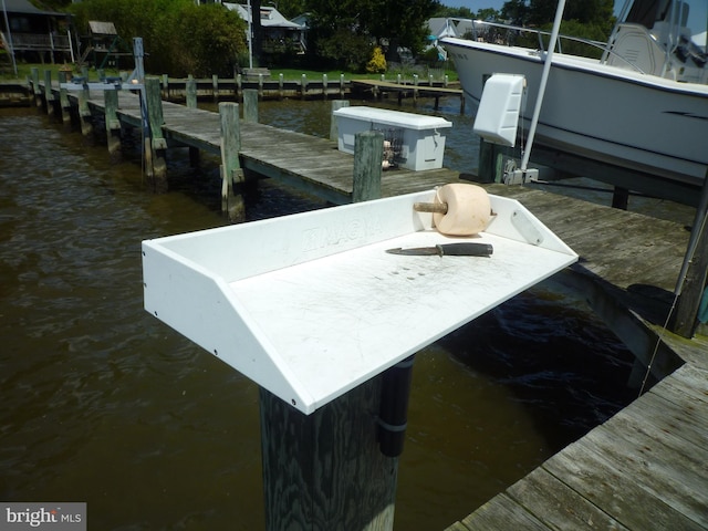 view of dock with a water view