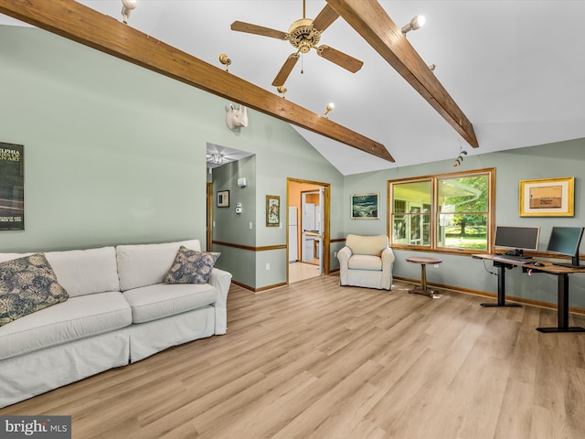 living room with vaulted ceiling with beams, light hardwood / wood-style flooring, and ceiling fan