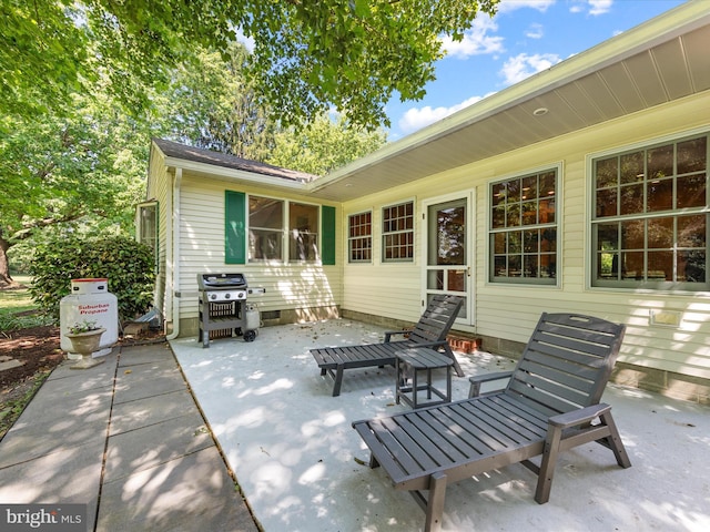 view of patio featuring a grill