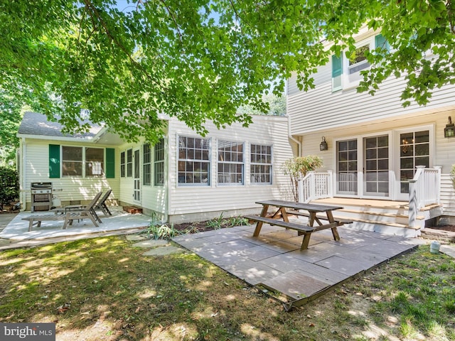 rear view of house with a patio