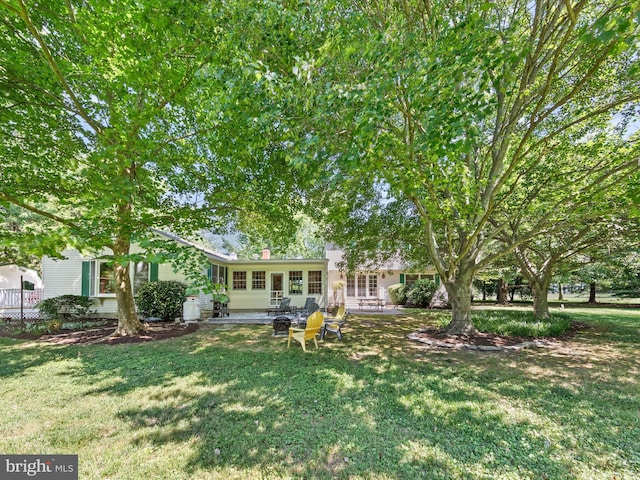 exterior space featuring a front lawn