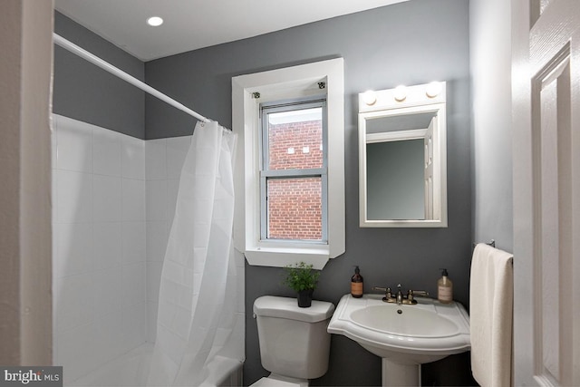 bathroom with sink and toilet