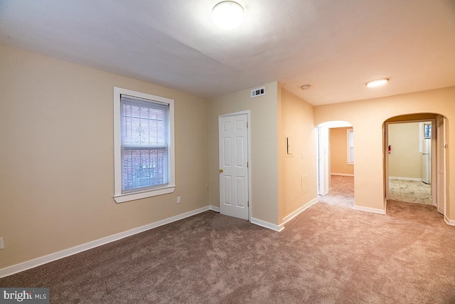 unfurnished bedroom with carpet